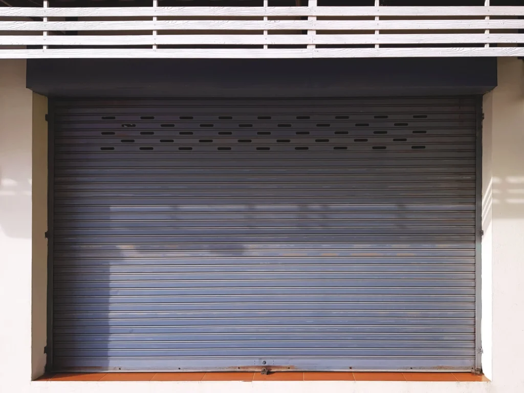 full-frame-corrugated-metal-door-at-store-front-2024-05-27-01-08-20-utc-min